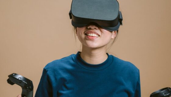 teenage girl playing with virtual reality