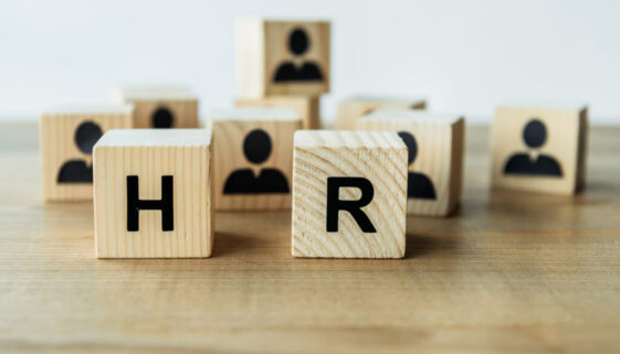 selective focus of hr lettering on wooden cubes on table